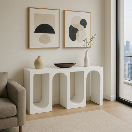 Modern interior with an Archwell console table from Love Hohm, abstract art, and decor items.