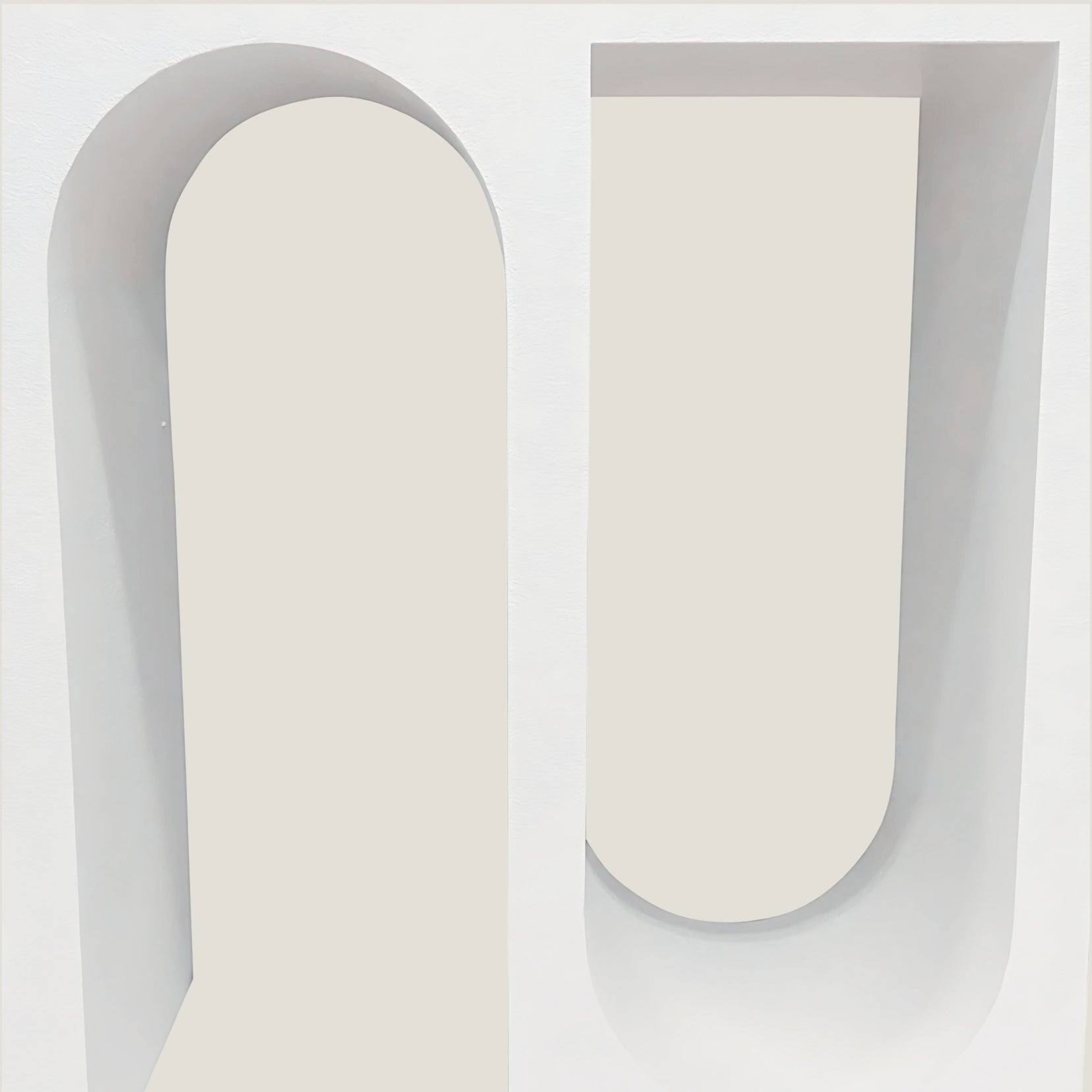 Archwell console from Love Hohm with a gray handle on a light gray background