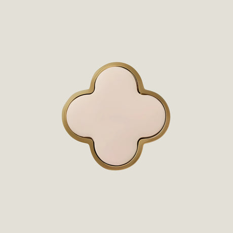 Charmant knob handle from Love Hohm on a beige background
