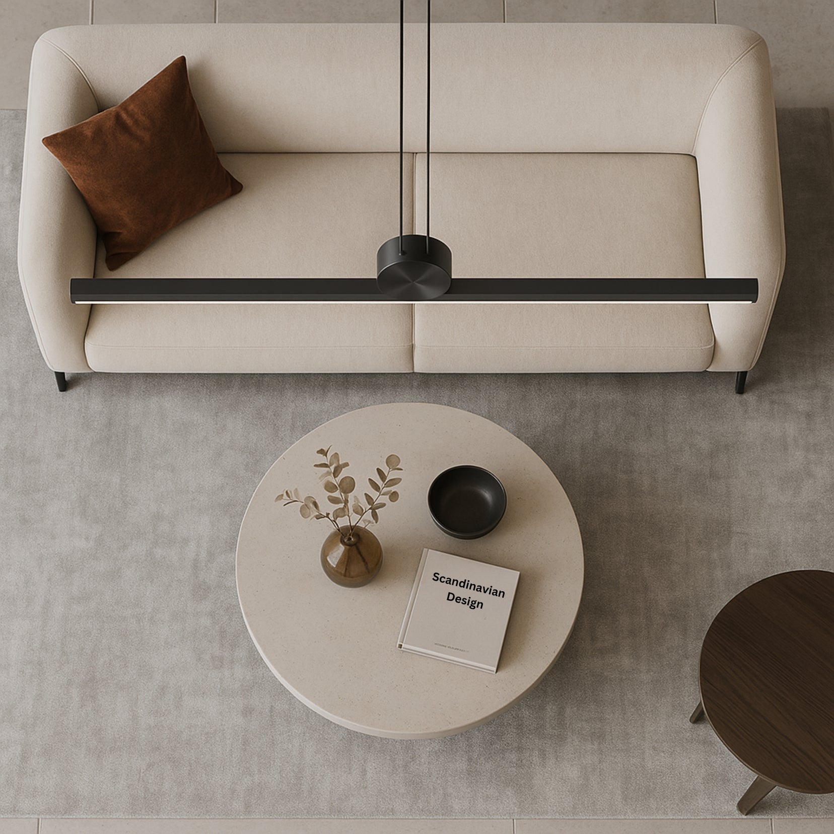 Chord pendant light from Love Hohm in a minimalistic living room.