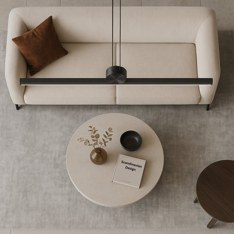 Chord pendant light from Love Hohm in a minimalistic living room.