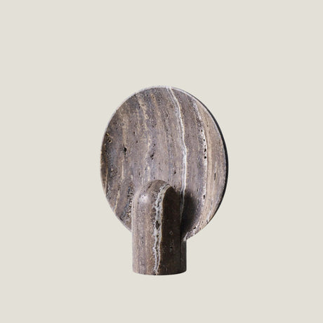 Fosse travertine table lamp from Love Hohm on a beige background