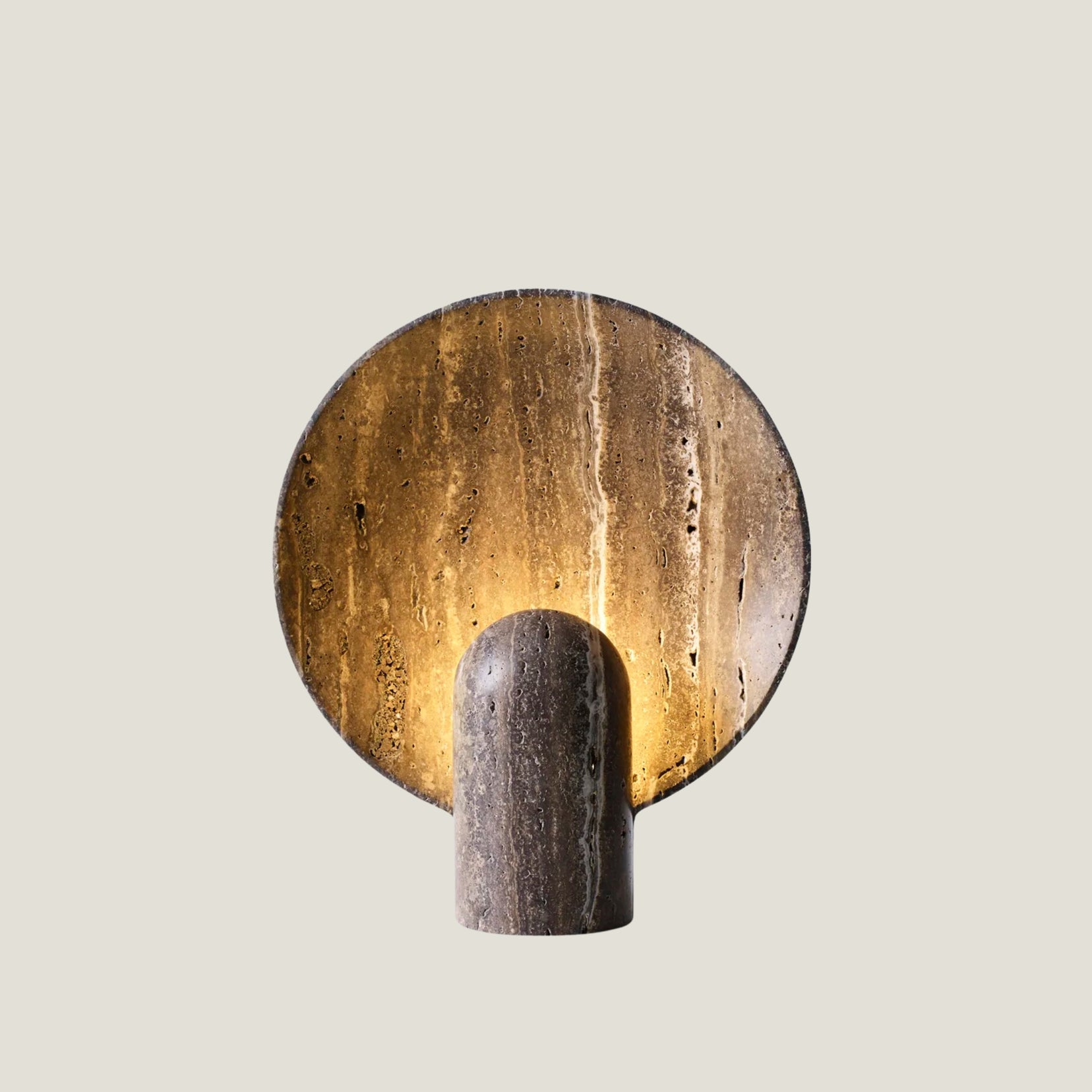 Fosse travertine table lamp from Love Hohm on a light gray background