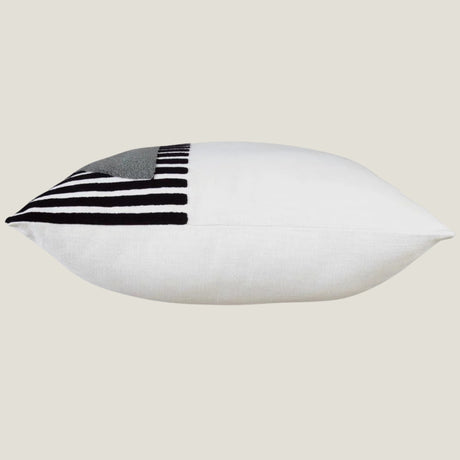 Glyph decorative pillow from Love Hohm with black and gray striped pattern on a beige background