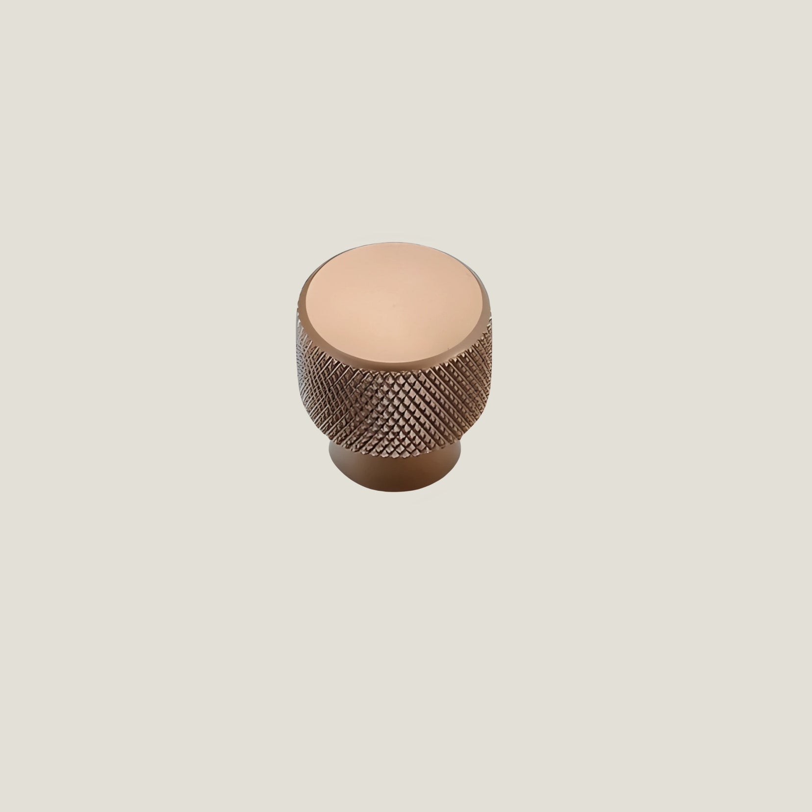 Grain knurled knob from Love Hohm on a beige background