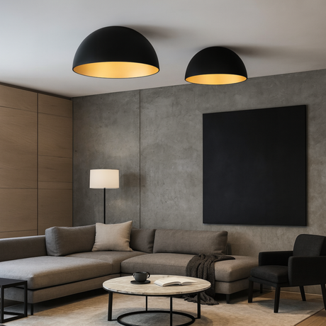 Modern living room with gray sectional sofa, round coffee table, and black Haven ceiling light from Love Hohm