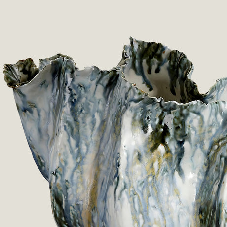 Marrow marble-patterned ceramic vase from Love Hohm on a light gray background