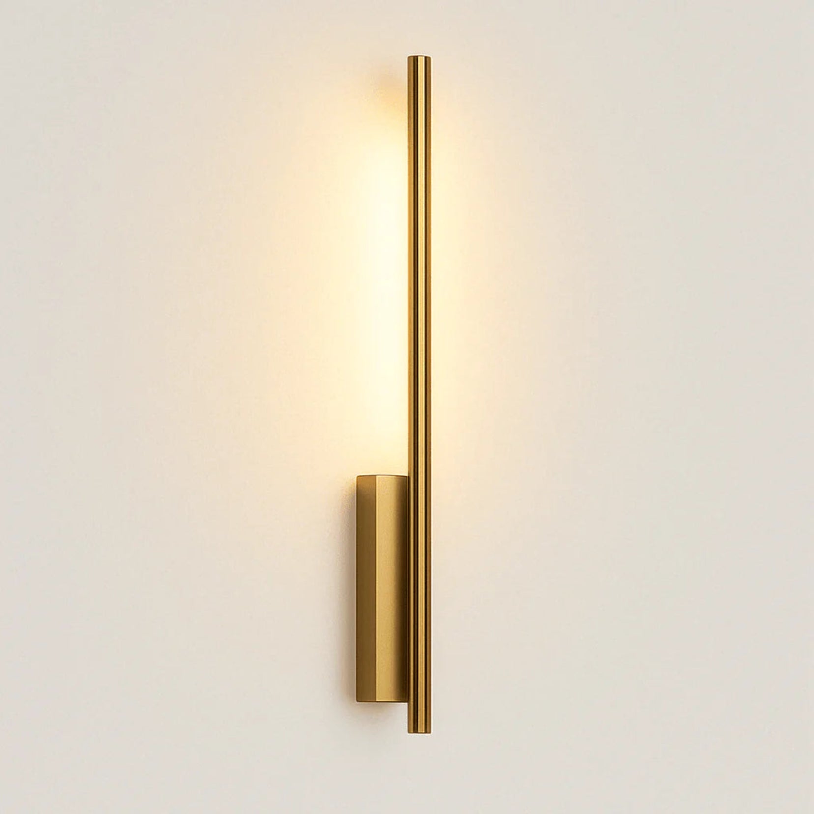 Northcut minimalist wall lamp from Love Hohm on a light gray background