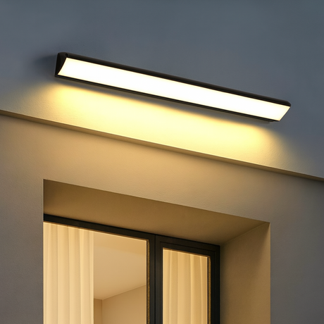 Quill outdoor wall lamp from Love Hohm on a building exterior.