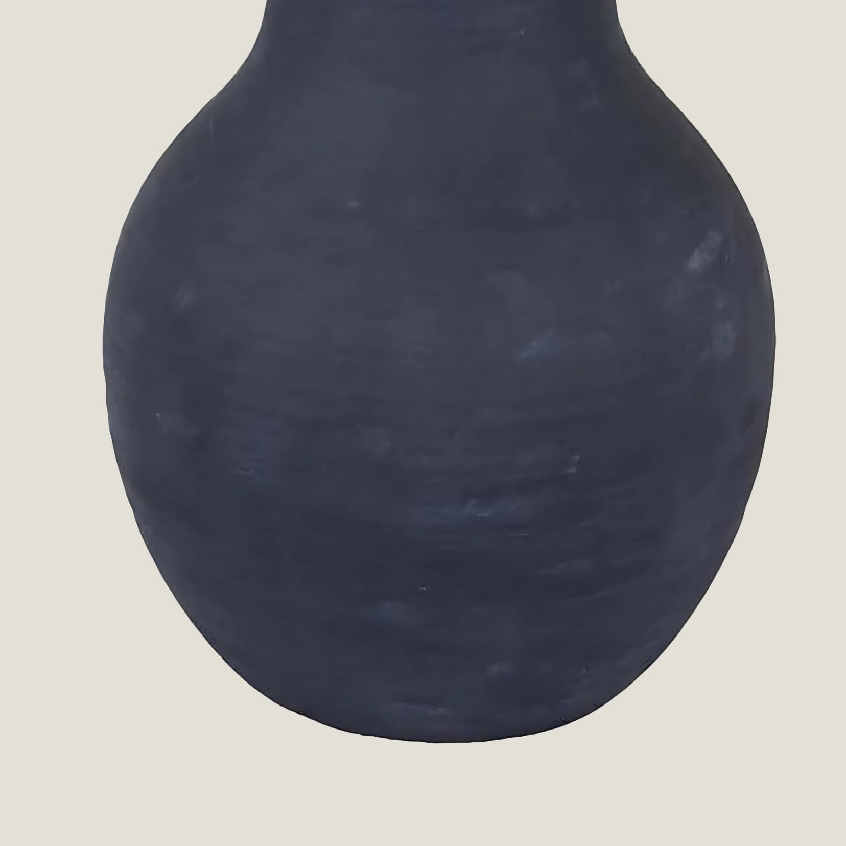 Spicula black textured ceramic vase from Love hohm on a light gray background