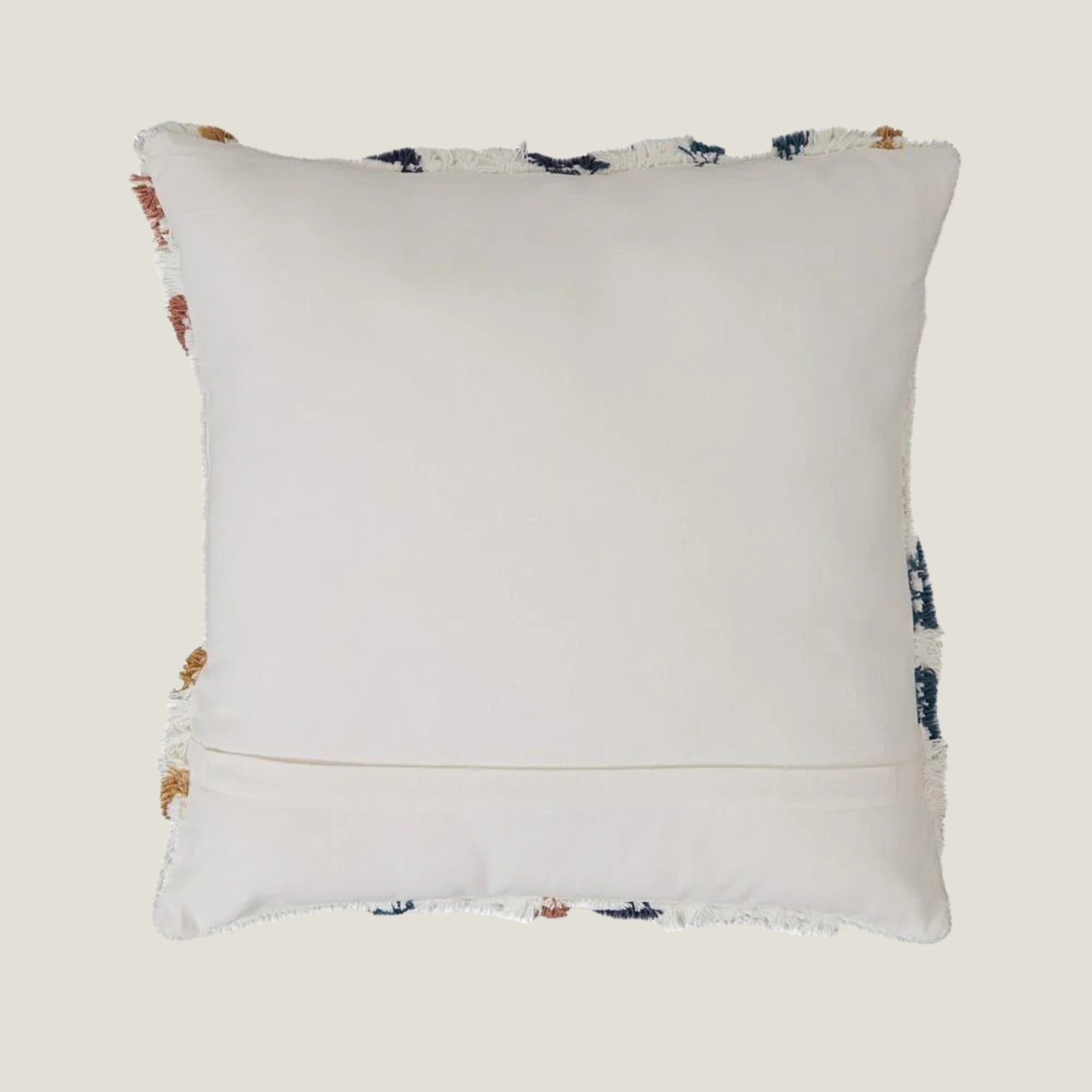 Stillwater decorative accent pillow from Love Hohm with colorful trim on a white background