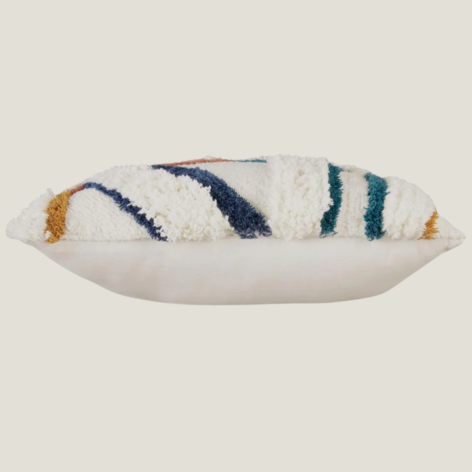 Stillwater decorative accent pillow from Love Hohm with striped pattern on a beige background
