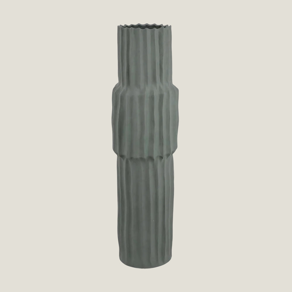 Tellure green sculptural floor vase from Love Hohm on a light gray background