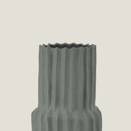 Tellure sculptural floor vase from Love Hohm on a light beige background