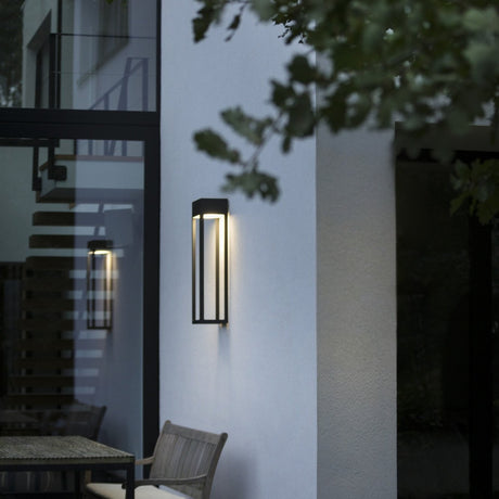 Threshold outdoor wall light from Love Hohm on a white wall with a blurred background
