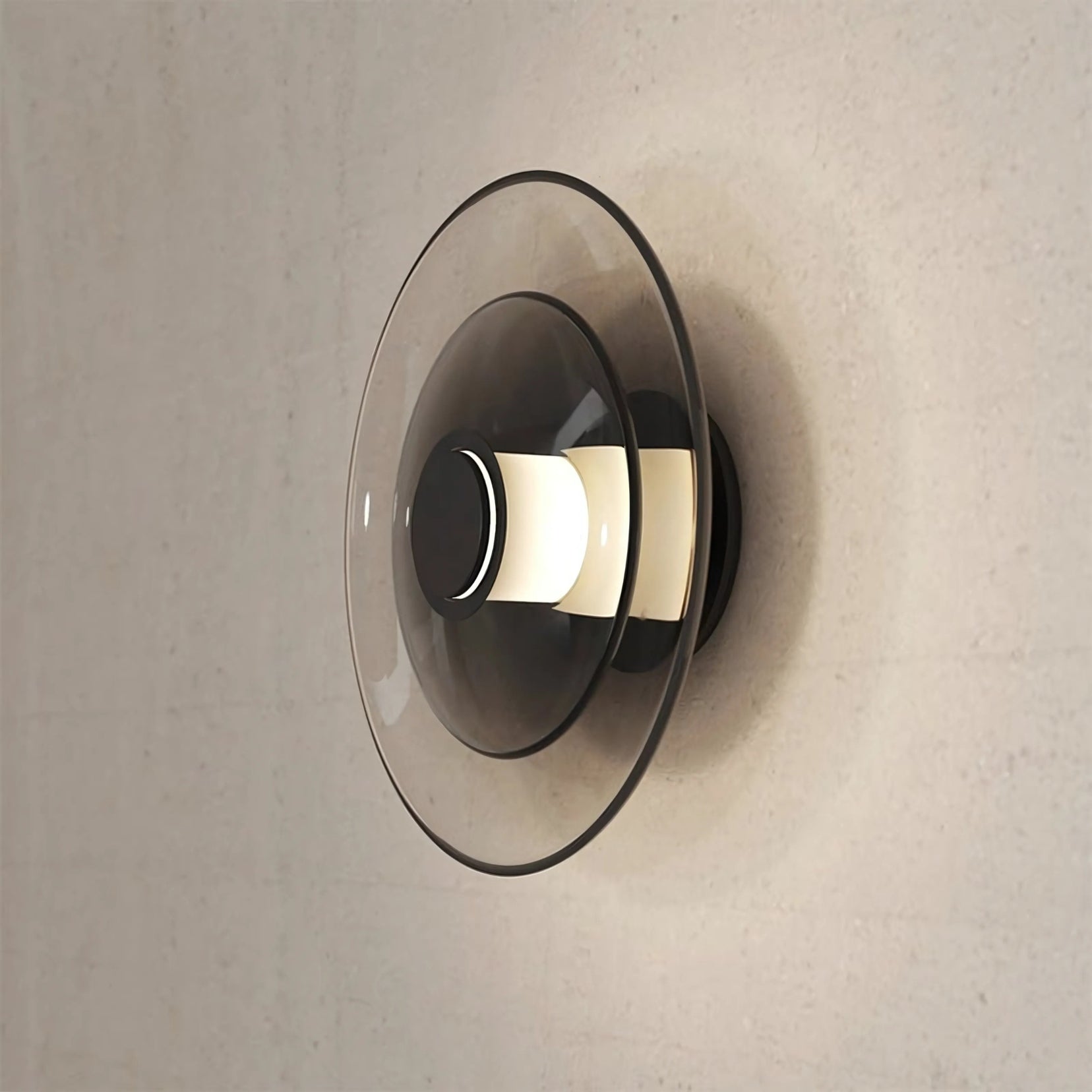 Modern Tondo wall light fixture on a neutral wall