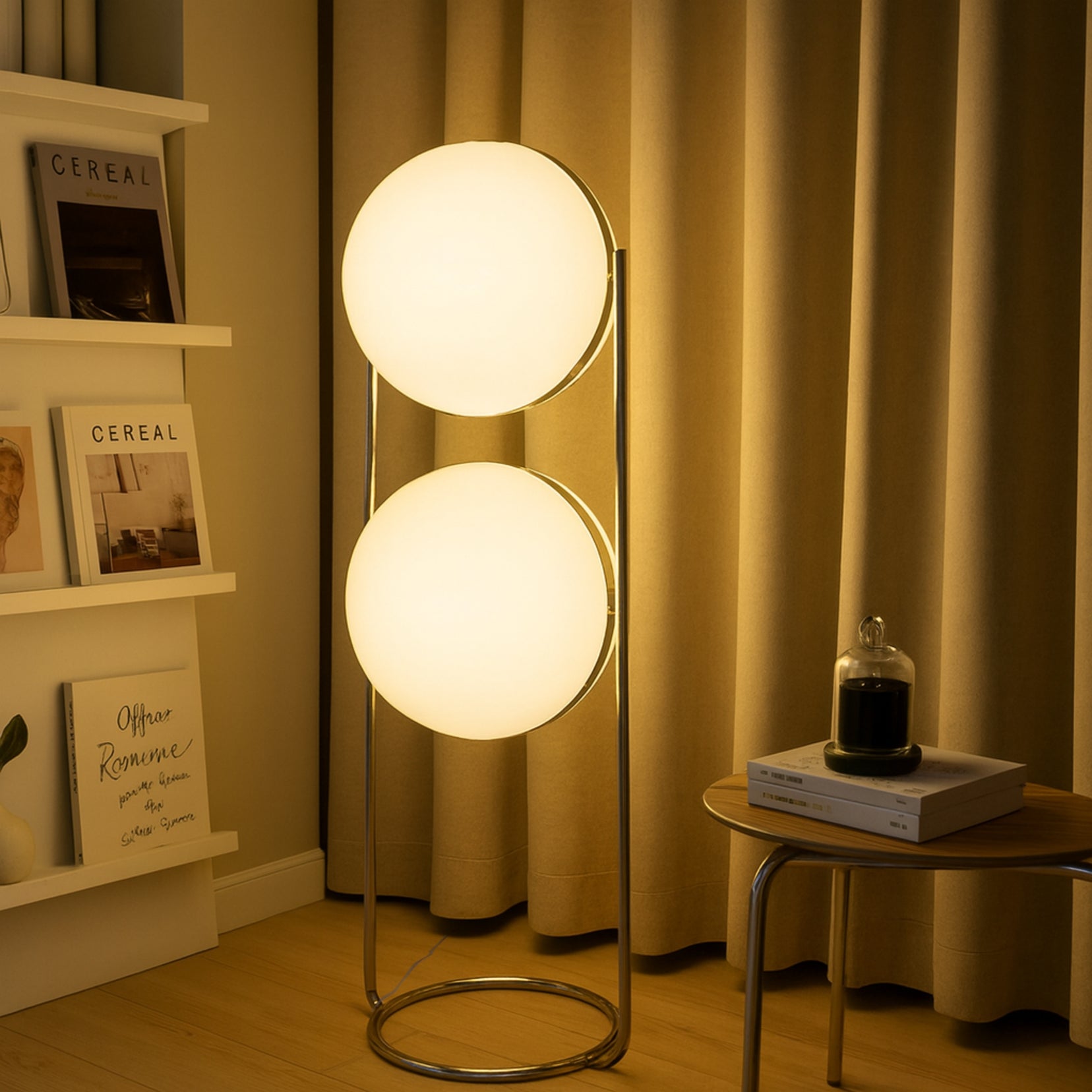 Totem floor lamp from Love Hohm with two spherical lights in a cozy room setting.