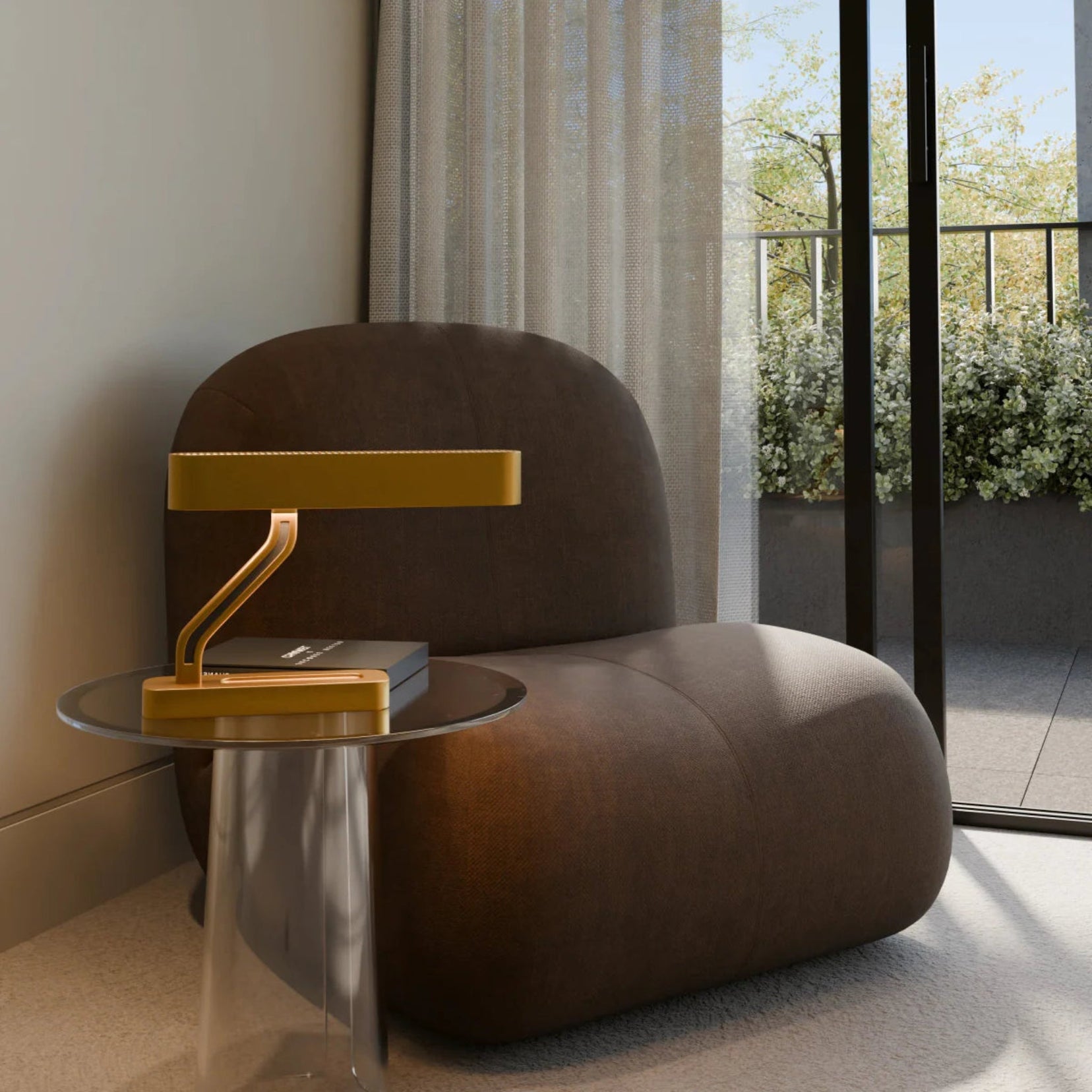 Modern interior with a brown armchair and brass Vector desk lamp by Love Hohm