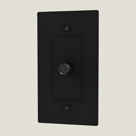 Verge brass dimmer from Love Hohm on a beige background
